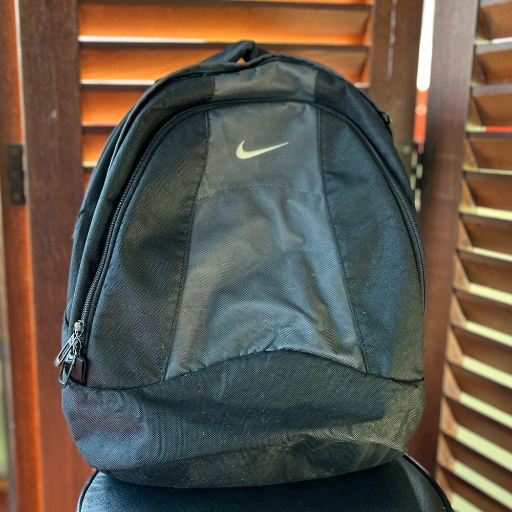 Black and grey Nike backpack
